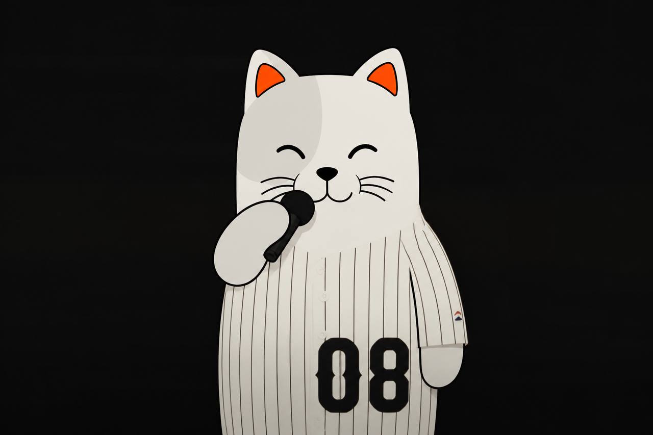 Purr Cat holding a microphone in a baseball jersey